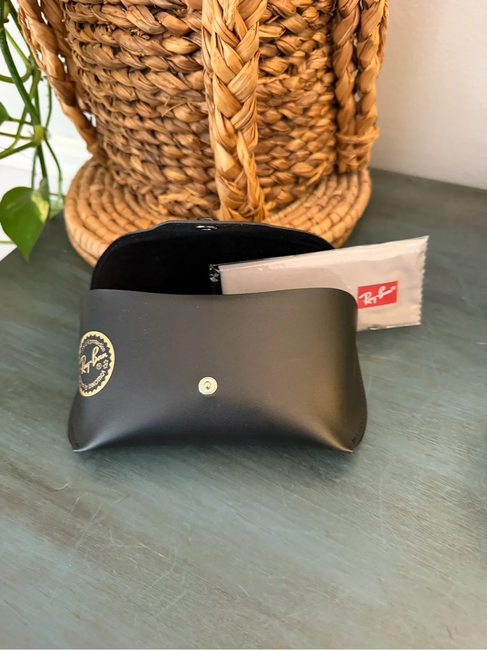 Ray-Ban Sunglasses case with signature gold snap closure. Glass cleaning cloth